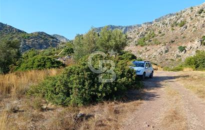 MARMARİS ORHANİYE KIZKUMUNDA PANORAMİK DENİZ MANZARALI ARSA
