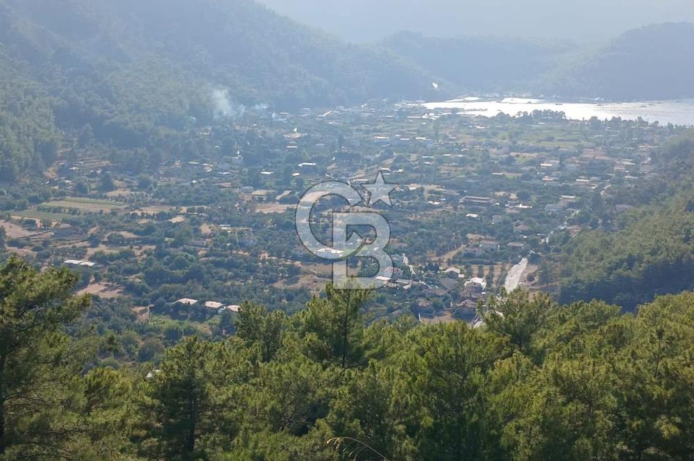 MARMARİS ORHANİYE KIZKUMUNDA PANORAMİK DENİZ MANZARALI ARSA