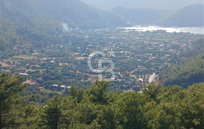 MARMARİS ORHANİYE KIZKUMUNDA PANORAMİK DENİZ MANZARALI ARSA