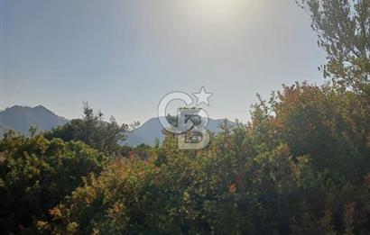 MARMARİS ORHANİYE KIZKUMUNDA PANORAMİK DENİZ MANZARALI ARSA
