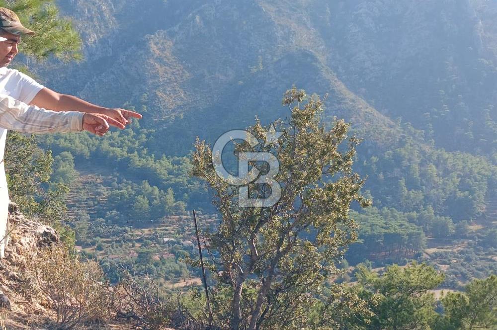 MARMARİS ORHANİYE KIZKUMUNDA PANORAMİK DENİZ MANZARALI ARSA