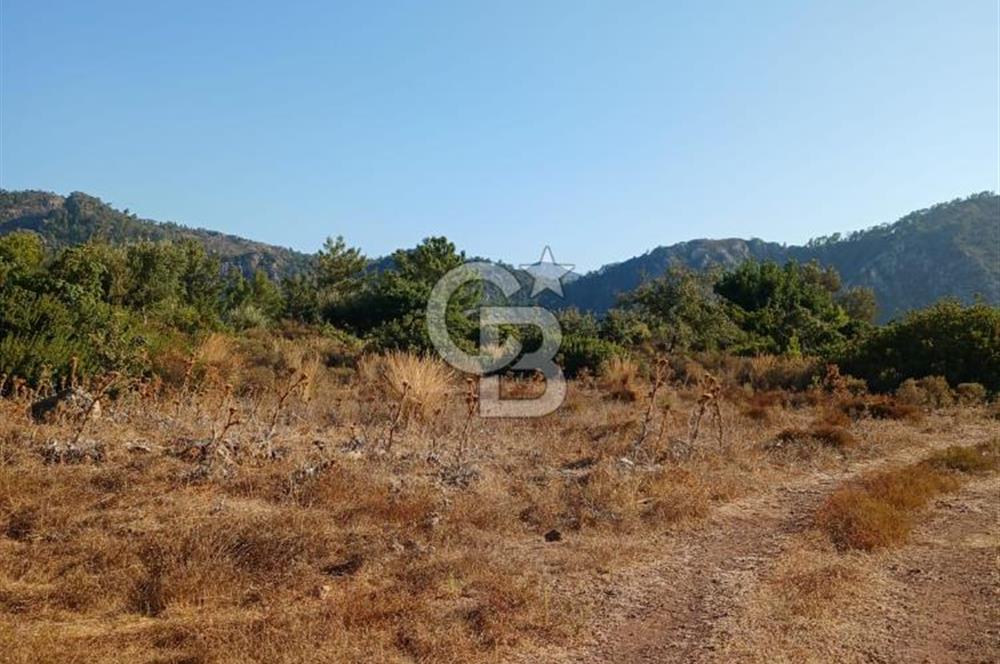 MARMARİS ORHANİYE KIZKUMUNDA PANORAMİK DENİZ MANZARALI ARSA