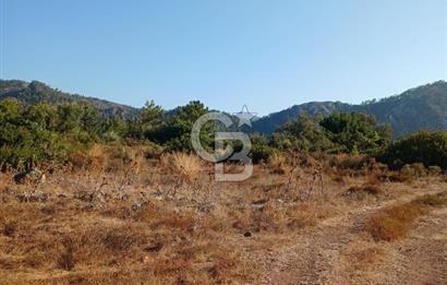 MARMARİS ORHANİYE KIZKUMUNDA PANORAMİK DENİZ MANZARALI ARSA