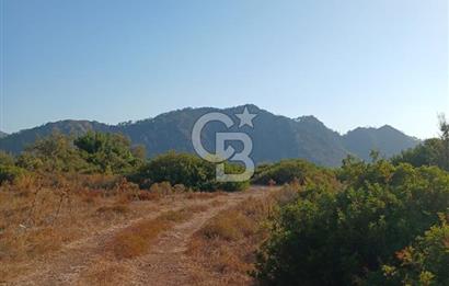 MARMARİS ORHANİYE KIZKUMUNDA PANORAMİK DENİZ MANZARALI ARSA
