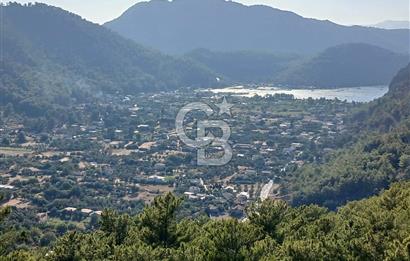 MARMARİS ORHANİYE KIZKUMUNDA PANORAMİK DENİZ MANZARALI ARSA