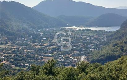 MARMARİS ORHANİYE KIZKUMUNDA PANORAMİK DENİZ MANZARALI ARSA