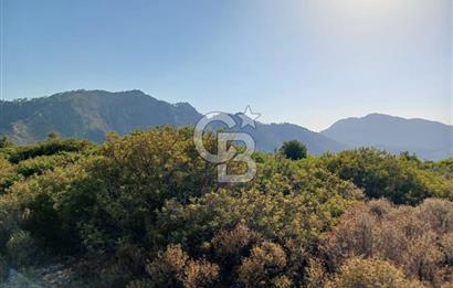 MARMARİS ORHANİYE KIZKUMUNDA PANORAMİK DENİZ MANZARALI ARSA