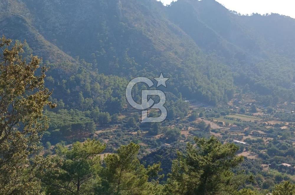 MARMARİS ORHANİYE KIZKUMUNDA PANORAMİK DENİZ MANZARALI ARSA