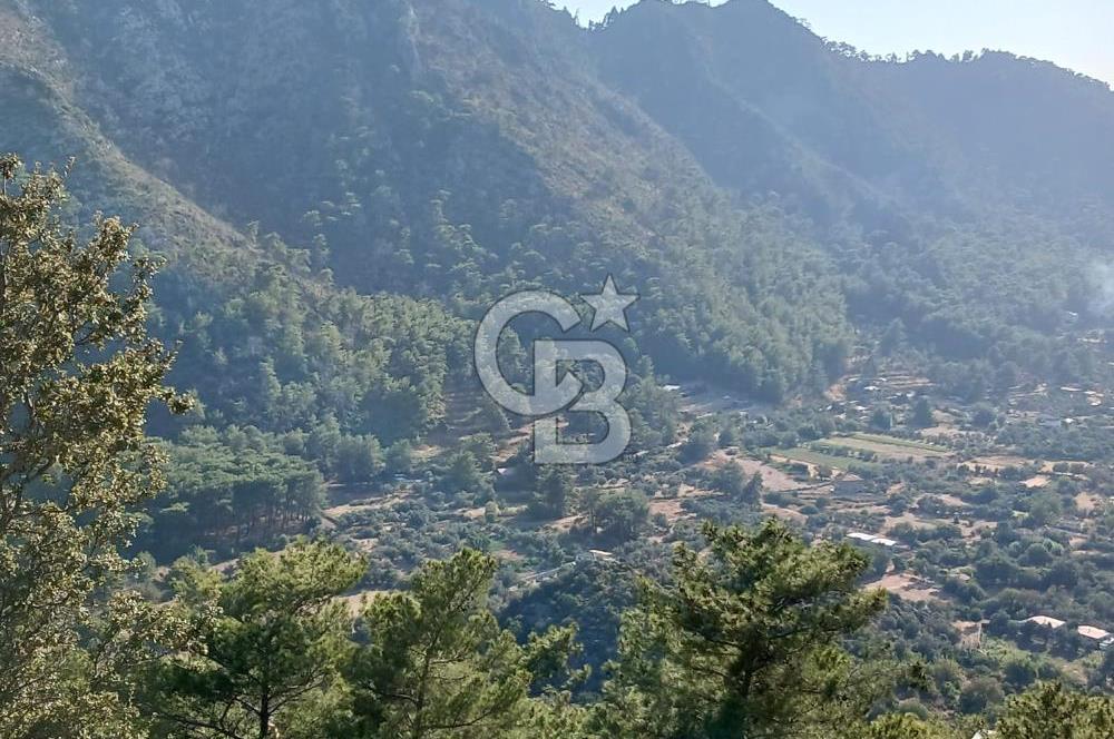 MARMARİS ORHANİYE KIZKUMUNDA PANORAMİK DENİZ MANZARALI ARSA