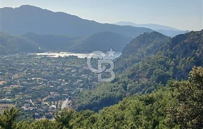 MARMARİS ORHANİYE KIZKUMUNDA PANORAMİK DENİZ MANZARALI ARSA