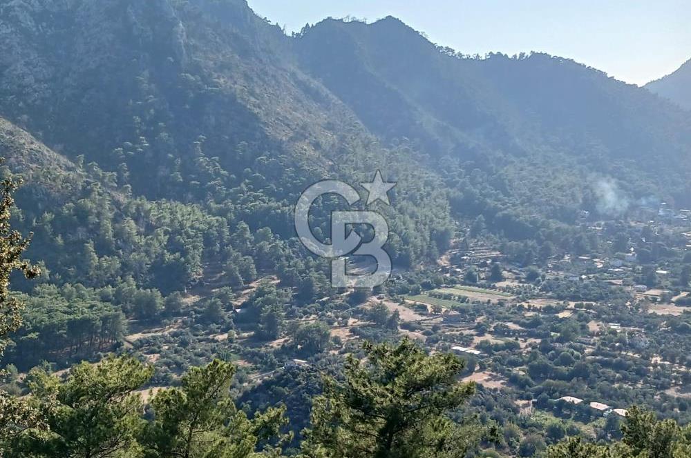 MARMARİS ORHANİYE KIZKUMUNDA PANORAMİK DENİZ MANZARALI ARSA