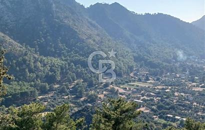 MARMARİS ORHANİYE KIZKUMUNDA PANORAMİK DENİZ MANZARALI ARSA