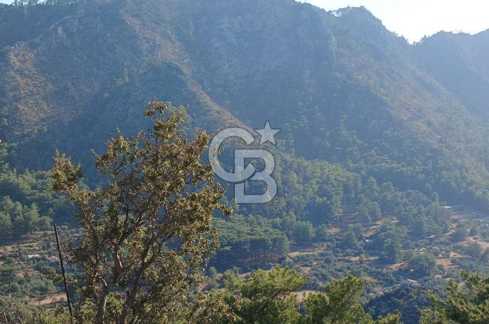 MARMARİS ORHANİYE KIZKUMUNDA PANORAMİK DENİZ MANZARALI ARSA