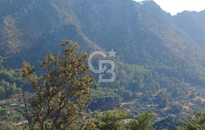 MARMARİS ORHANİYE KIZKUMUNDA PANORAMİK DENİZ MANZARALI ARSA