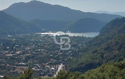 MARMARİS ORHANİYE KIZKUMUNDA PANORAMİK DENİZ MANZARALI ARSA