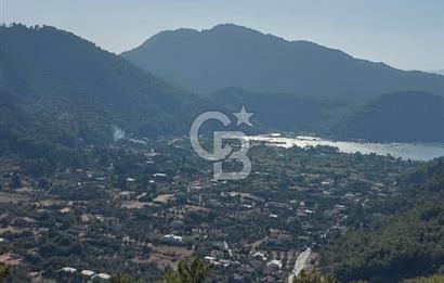 MARMARİS ORHANİYE KIZKUMUNDA PANORAMİK DENİZ MANZARALI ARSA