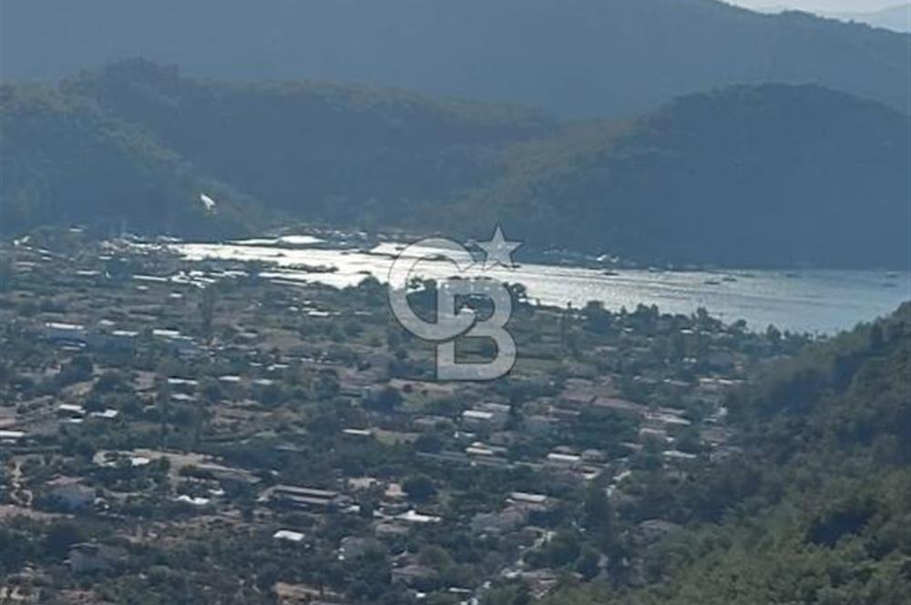 MARMARİS ORHANİYE KIZKUMUNDA PANORAMİK DENİZ MANZARALI ARSA