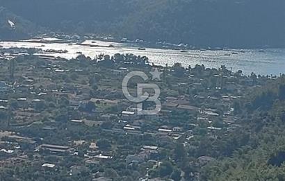 MARMARİS ORHANİYE KIZKUMUNDA PANORAMİK DENİZ MANZARALI ARSA