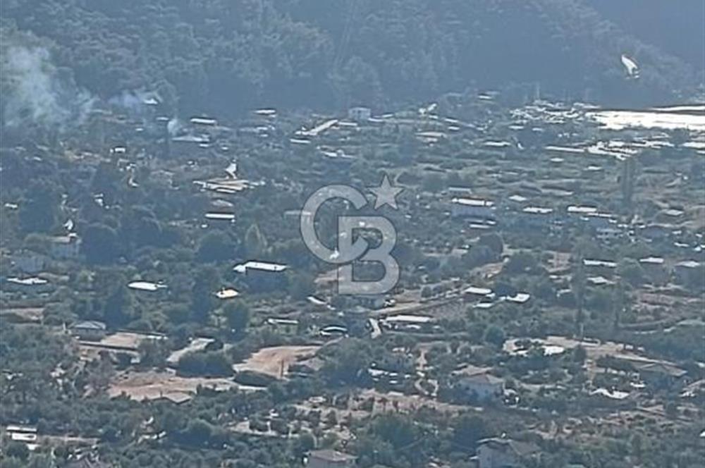 MARMARİS ORHANİYE KIZKUMUNDA PANORAMİK DENİZ MANZARALI ARSA