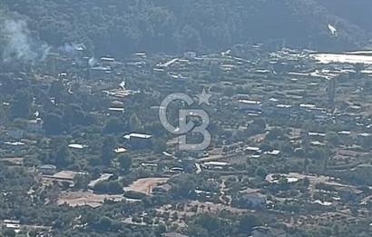 MARMARİS ORHANİYE KIZKUMUNDA PANORAMİK DENİZ MANZARALI ARSA