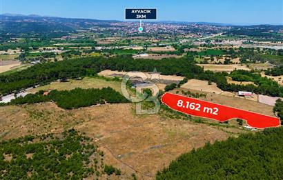 ÇANAKKALE AYVACIK SAZLI KÖYÜNDE 8.162 M² İMARLI SATILIK ARSA