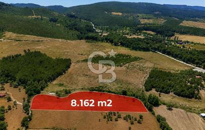 ÇANAKKALE AYVACIK SAZLI KÖYÜNDE 8.162 M² İMARLI SATILIK ARSA