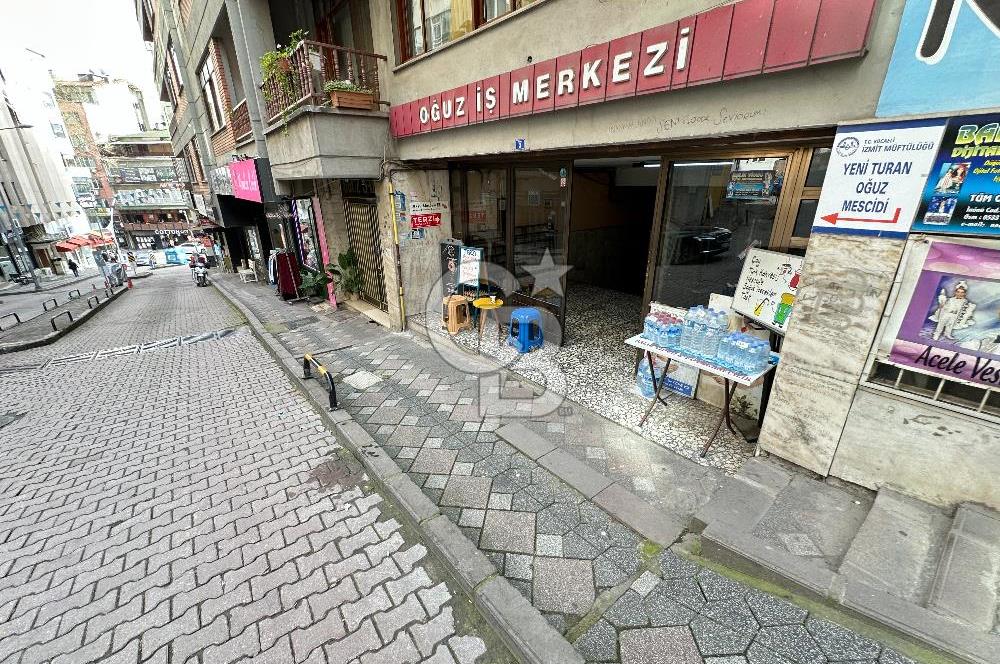İZMİT İNÖNÜ CADDESİ OĞUZ İŞ MERKEZİN'NDE SATILIK DÜKKAN