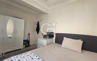 DİKİLİ ÇANDARLI MERKEZDE 1+1 EŞYALI BAHÇELİ SATILIK DAİRE