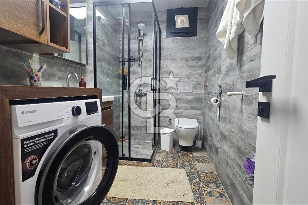 DİKİLİ ÇANDARLI MERKEZDE 1+1 EŞYALI BAHÇELİ SATILIK DAİRE