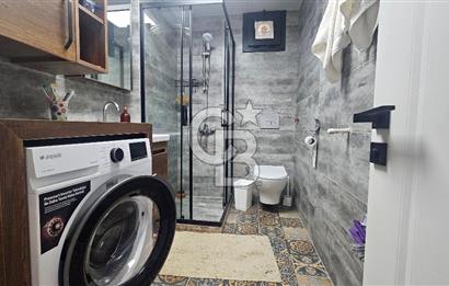 DİKİLİ ÇANDARLI MERKEZDE 1+1 EŞYALI BAHÇELİ SATILIK DAİRE