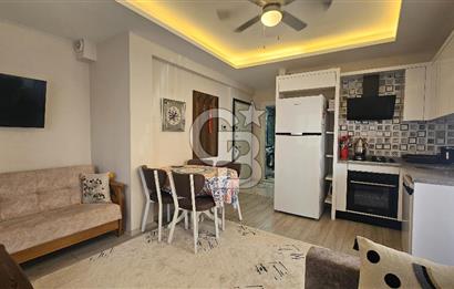 DİKİLİ ÇANDARLI MERKEZDE 1+1 EŞYALI BAHÇELİ SATILIK DAİRE
