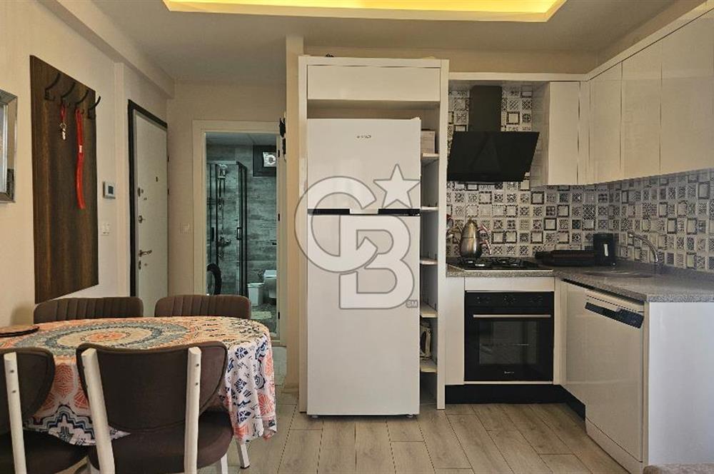 DİKİLİ ÇANDARLI MERKEZDE 1+1 EŞYALI BAHÇELİ SATILIK DAİRE