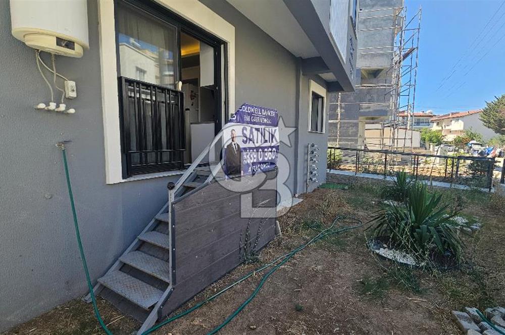 DİKİLİ ÇANDARLI MERKEZDE 1+1 EŞYALI BAHÇELİ SATILIK DAİRE