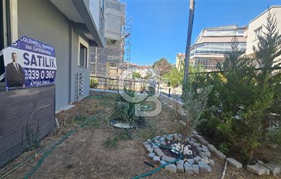 DİKİLİ ÇANDARLI MERKEZDE 1+1 EŞYALI BAHÇELİ SATILIK DAİRE