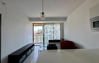 Ontan Bayraklı'da Kiralık Eşyalı Cadde Cepheli Ferah 1+1 Daire