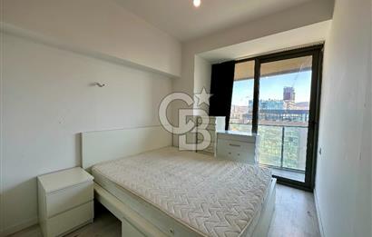 Ontan Bayraklı'da Kiralık Eşyalı Cadde Cepheli Ferah 1+1 Daire