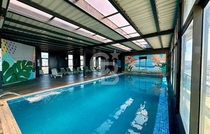 Ontan Bayraklı'da Kiralık Eşyalı Cadde Cepheli Ferah 1+1 Daire