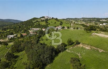 BORNOVA BEŞYOL’DA DOĞA İÇİNDE, KÖYE YAKIN 210 M² İFRAZLI PARSEL