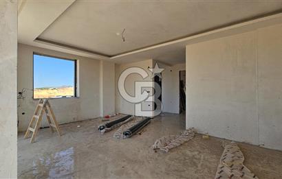 Ayvalık Küçükköy'de Havuzlu Butik Sitede Satılık 5+2 Taş Villa
