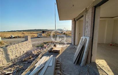 Ayvalık Küçükköy'de Havuzlu Butik Sitede Satılık 5+2 Taş Villa