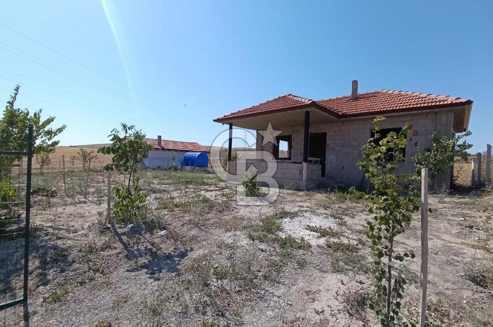 GÖLBAŞI SOĞULCAK'TA İÇİNDE NATAMAM MÜSTAKİL EV OLAN ARSA