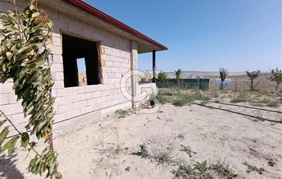 GÖLBAŞI SOĞULCAK'TA İÇİNDE NATAMAM MÜSTAKİL EV OLAN ARSA