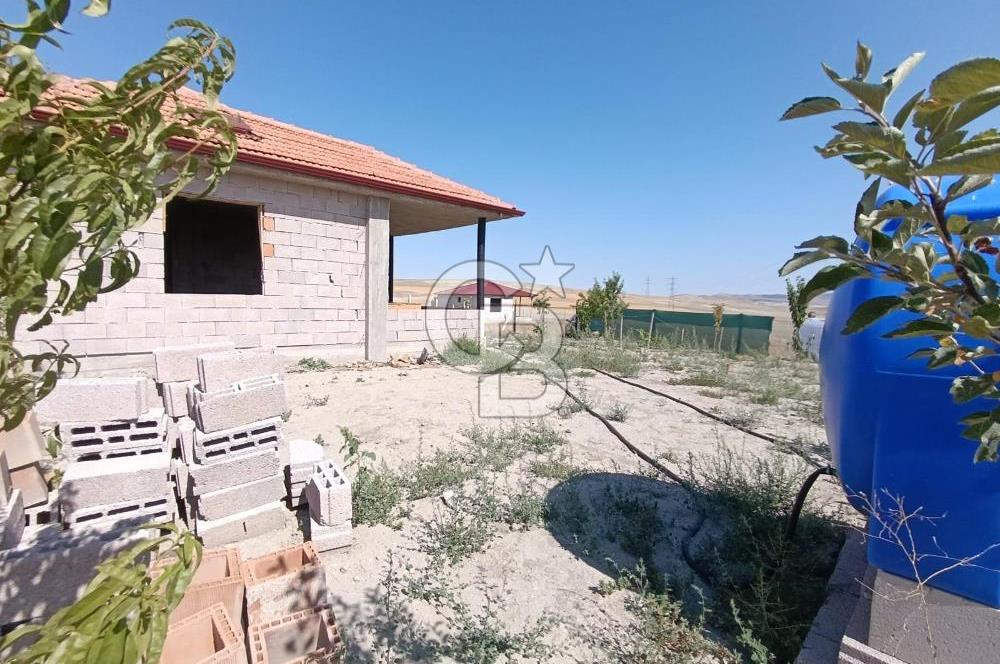 GÖLBAŞI SOĞULCAK'TA İÇİNDE NATAMAM MÜSTAKİL EV OLAN ARSA