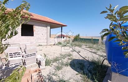 GÖLBAŞI SOĞULCAK'TA İÇİNDE NATAMAM MÜSTAKİL EV OLAN ARSA