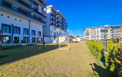 Kuşadası İkiçeşmelik te havuzlu sitede satılık 2+1 daire
