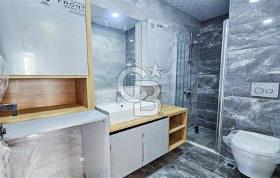 Kuşadası İkiçeşmelik te havuzlu sitede satılık 2+1 daire