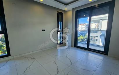 Kuşadası İkiçeşmelik te havuzlu sitede satılık 2+1 daire