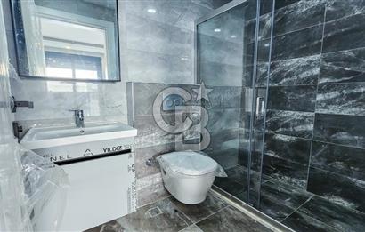 Kuşadası İkiçeşmelik te havuzlu sitede satılık 2+1 daire