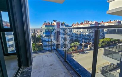 Kuşadası İkiçeşmelik te havuzlu sitede satılık 2+1 daire