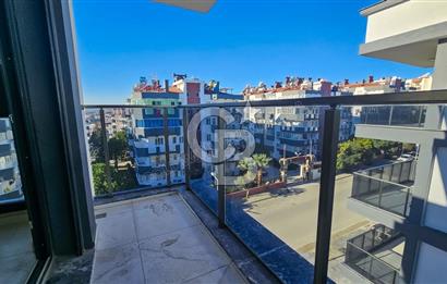 Kuşadası İkiçeşmelik te havuzlu sitede satılık 2+1 daire
